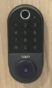 Close-up of a smart lock keypad used for self check-in