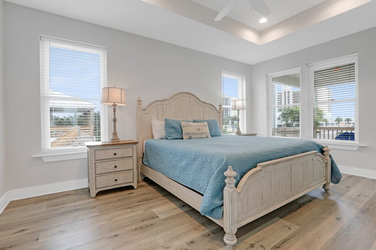 Spacious primary bedroom with king size bed and smart tv.