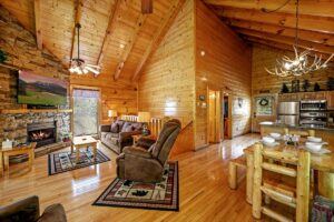 Enjoy the warmly lit, open floor plan adorned with rustic, cabin decor perfect for your mountain getaway.