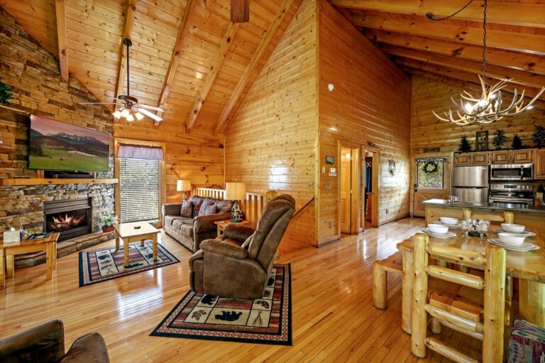 Enjoy the warmly lit, open floor plan adorned with rustic, cabin decor perfect for your mountain getaway.