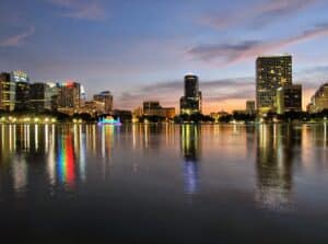 Downtown Orlando skyline reflected in Lake Eola at dusk
