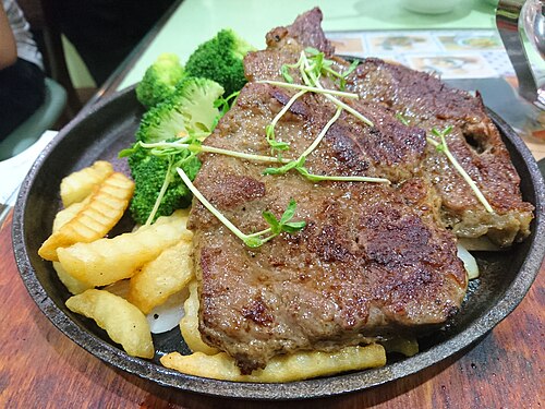 Grilled steak dinner with fries and broccoli at The Park Grill, Gatlinburg