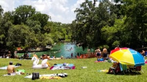 Swimmers and sunbathers at the spring-fed swimming area of Wekiwa Springs State Park